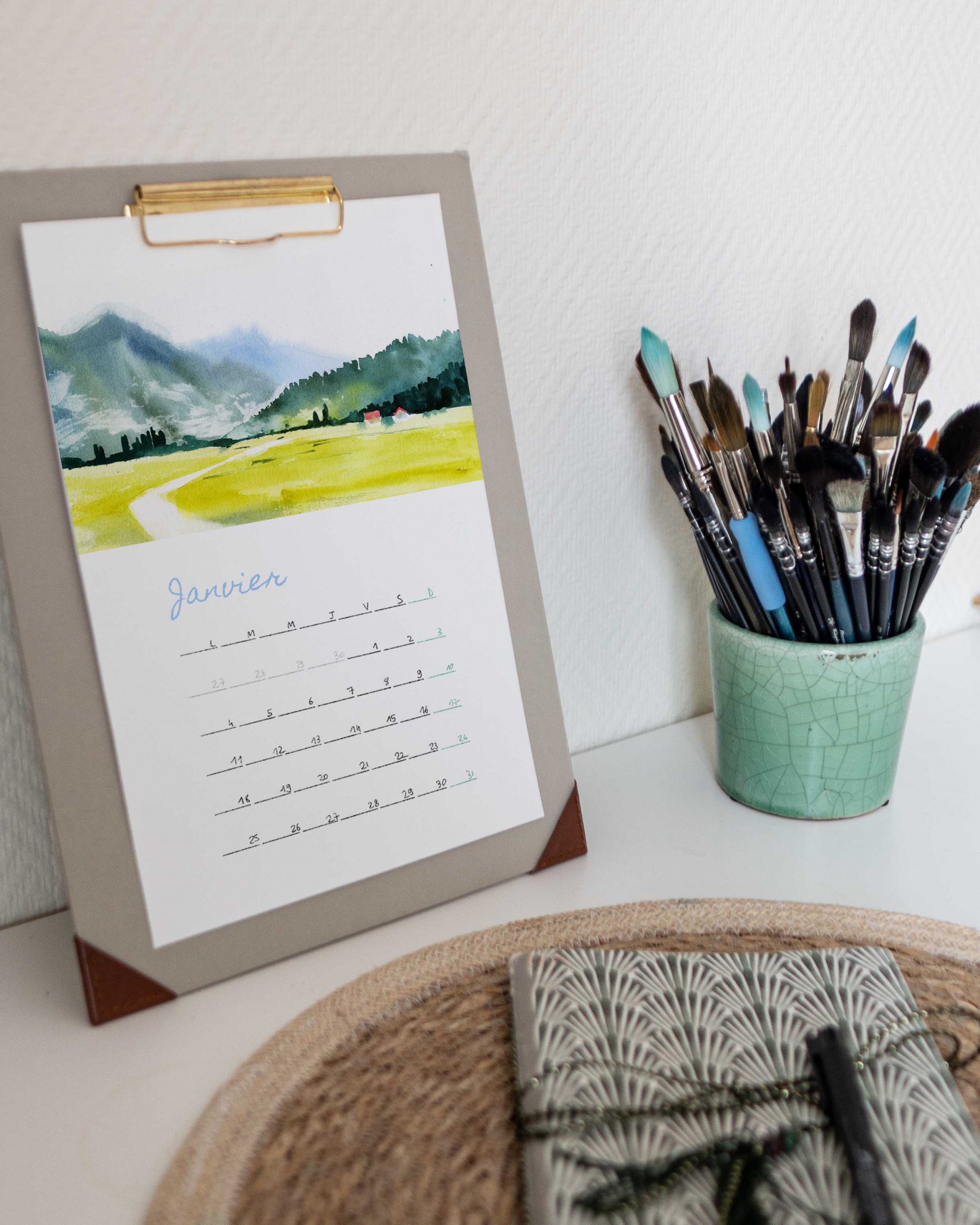 calendrier à l'aquarelle dans un porte feuille